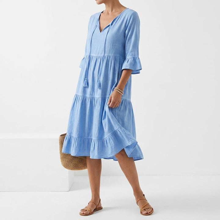 Côtelune™ — Robe smockée col V manches volantées