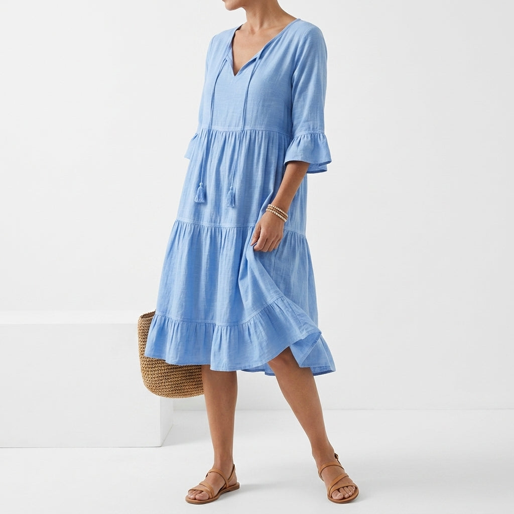 Côtelune™ — Robe smockée col V manches volantées